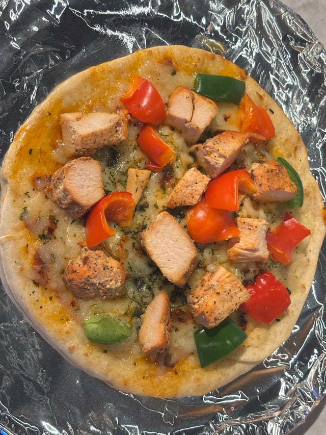 Naan Chicken Tikka Pizza.